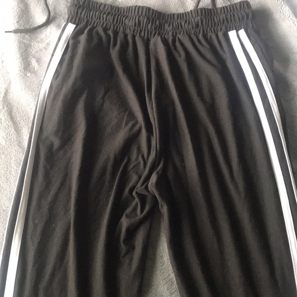 It’s black pants with white stripes. - Picture 2 of 2